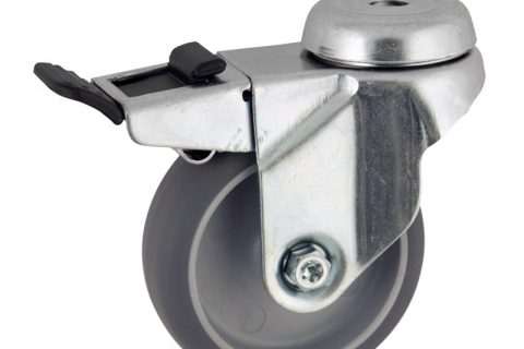 Zinc plated total lock castor 75mm for light trolleys,wheel made of grey rubber,double ball bearings.Bolt hole fitting