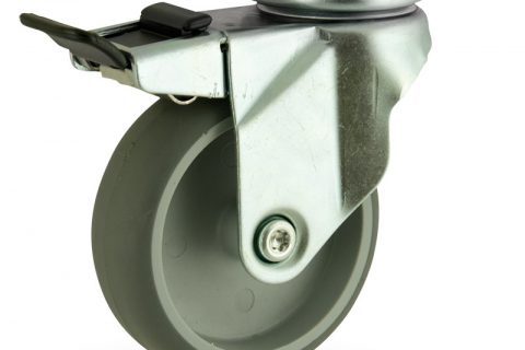 Zinc plated total lock castor 150mm for light trolleys,wheel made of grey rubber,double ball bearings.Top plate fitting