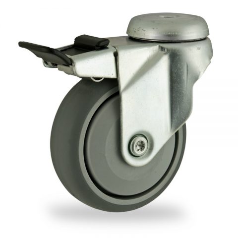 Zinc plated total lock castor 75mm for light trolleys,wheel made of grey rubber,single precision ball bearing.Bolt hole fitting