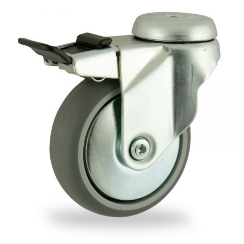 Zinc plated total lock castor 100mm for light trolleys,wheel made of grey rubber,plain bearing.Bolt hole fitting