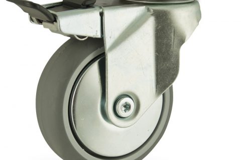 Zinc plated total lock castor 100mm for light trolleys,wheel made of grey rubber,double ball bearings.Top plate fitting