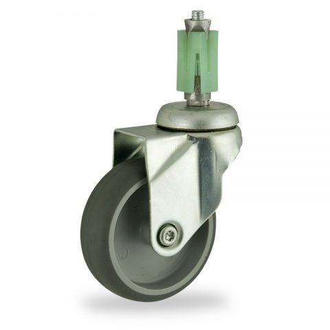 Zinc plated swivel castor 100mm for light trolleys,wheel made of grey rubber,double ball bearings.Fitting with square expander 27/31