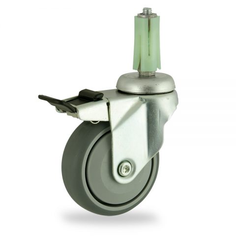 Zinc plated total lock castor 100mm for light trolleys,wheel made of grey rubber,single precision ball bearing.Fitting with round expander 19/23