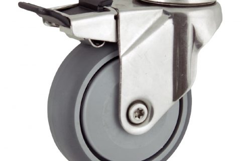 Stainless total lock castor 75mm for light trolleys,wheel made of grey rubber,single precision ball bearing.Bolt hole fitting
