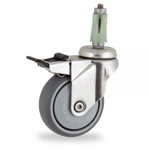 Stainless total lock castor 100mm for light trolleys,wheel made of grey rubber,single precision ball bearing.Fitting with square expander 27/31